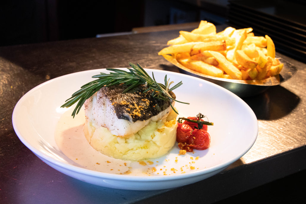 Royal cod with lobster sauce, plain potatoes, julienne carrots and leeks