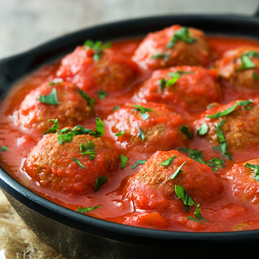 Meatballs in tomato sauce with mashed potatoes